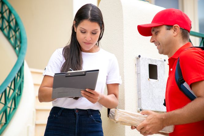Customer shopping at Home Depot with visible tool rentals and service desk