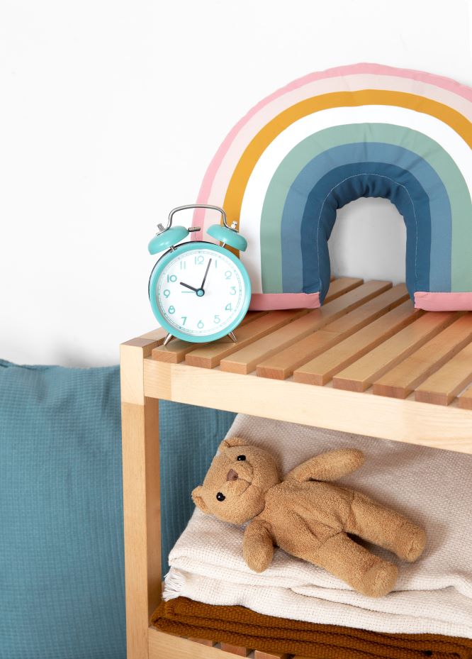Modern kids room with ththomedec furniture and eco-friendly storage solutions