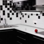 Modern kitchen backsplash with white subway tiles and stainless steel appliances