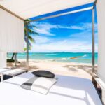 Hawaii vacation rental overlooking ocean at sunset