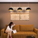 Modern living room with stylish Lumolog ceiling lights and warm ambiance