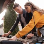 Jumpstarting a car using jumper cables step-by-step